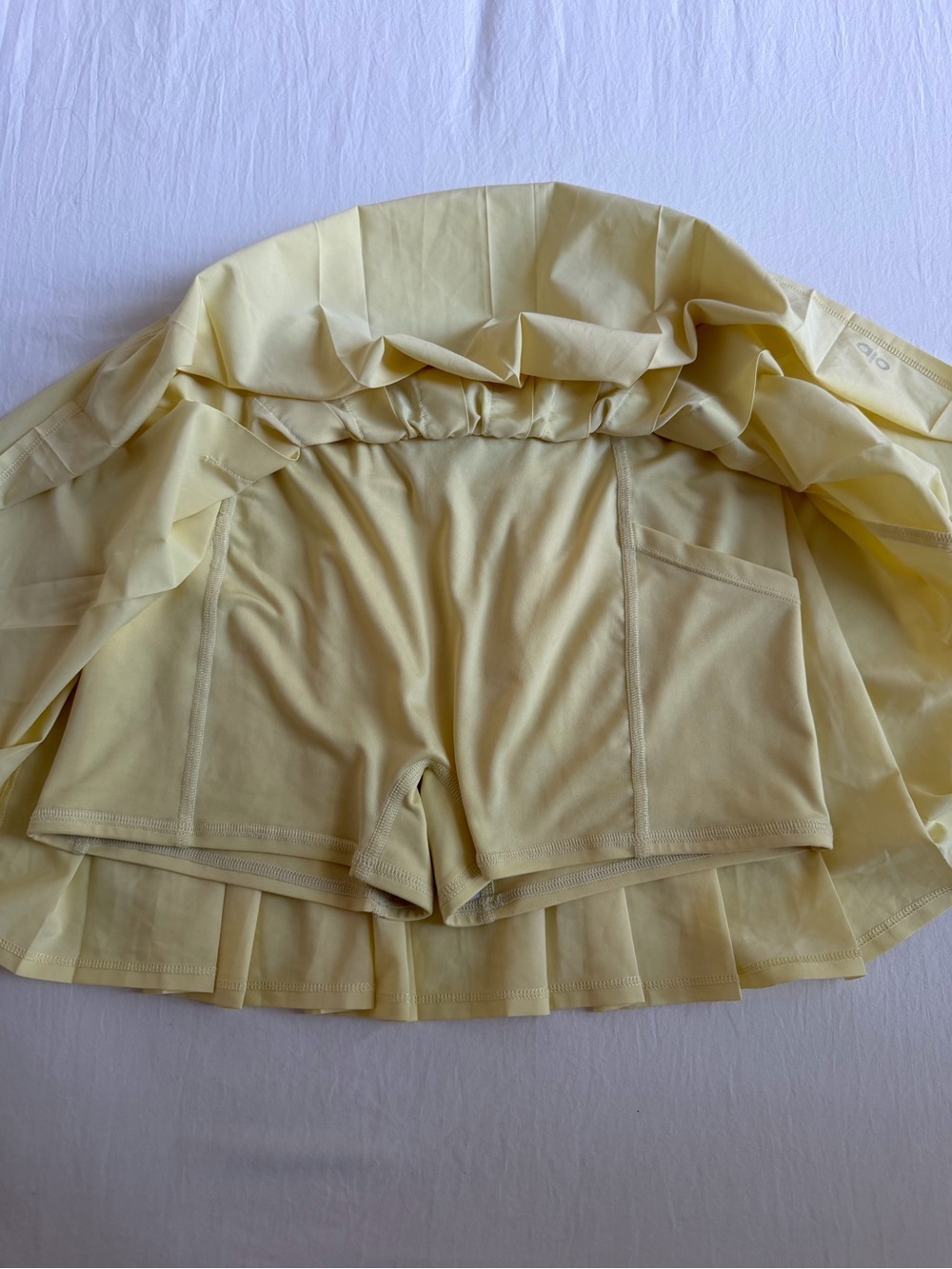 ALO Yoga Pleated Tennis Skirt, Butter Yellow - Picture 3 of 4
